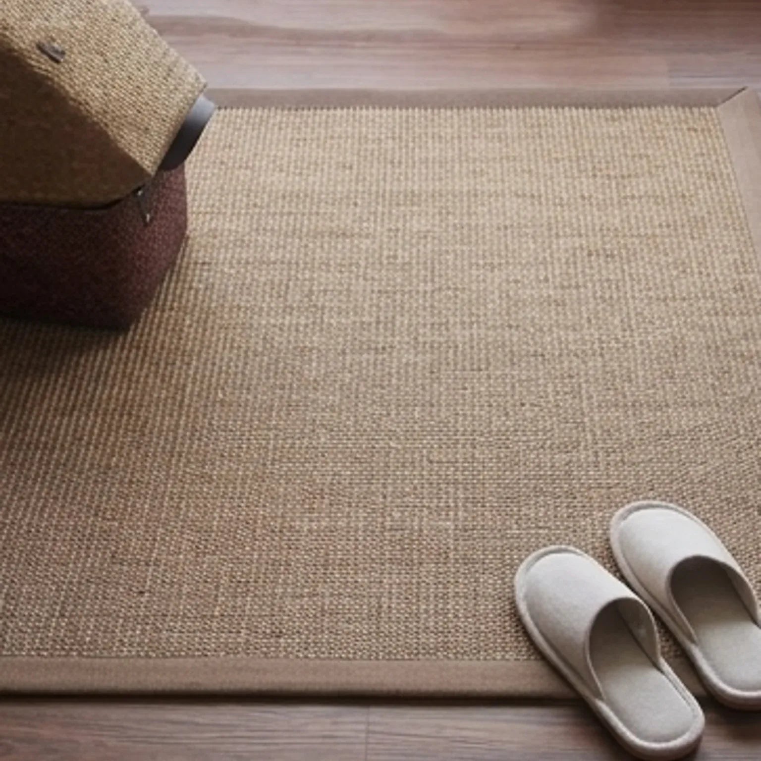 Natural Jute Rug – Handwoven | Tones, Rustic Home Decor — scale reference beside a complementary prop