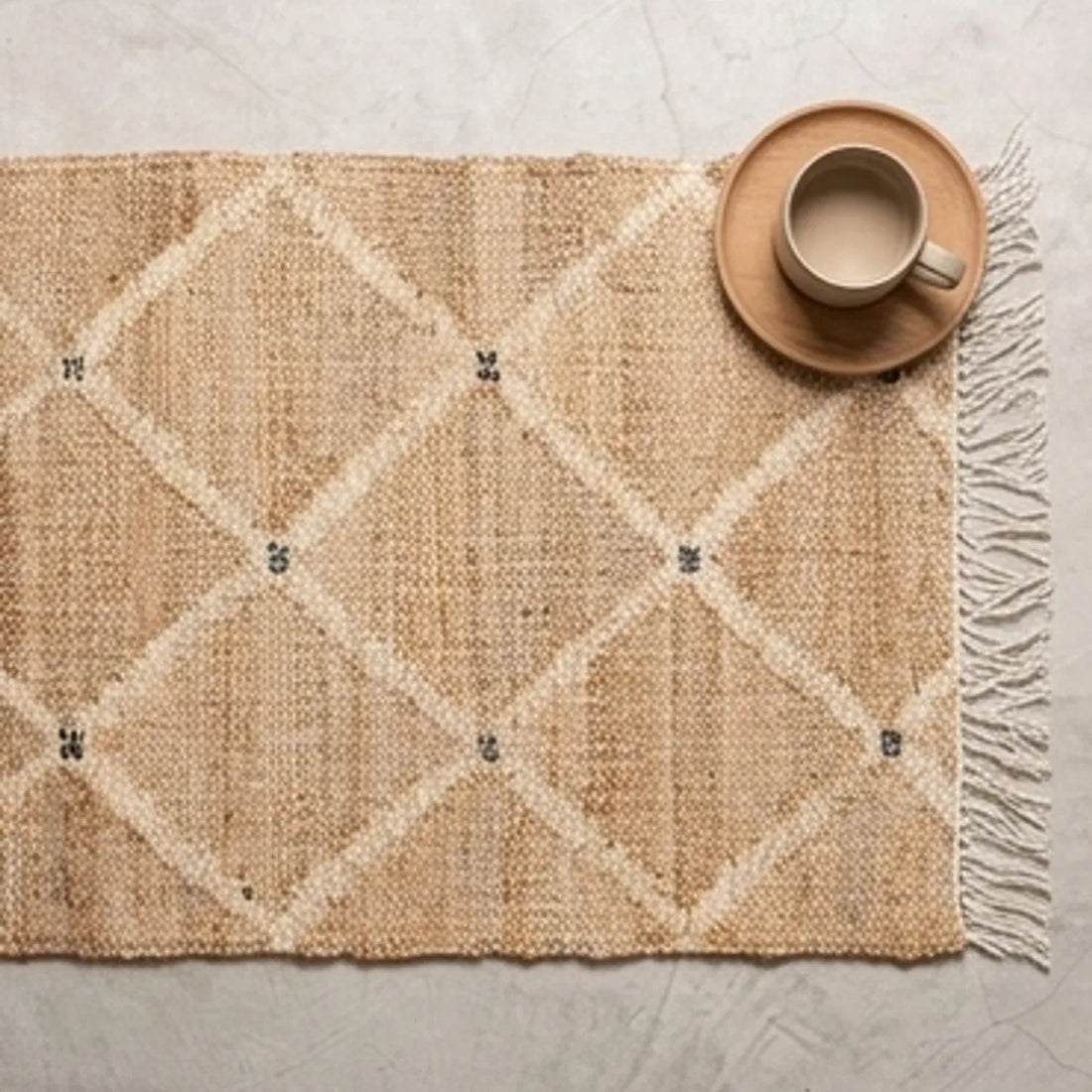 Indian Jute Rug - Beige Diamond Pattern — scale reference beside a complementary prop