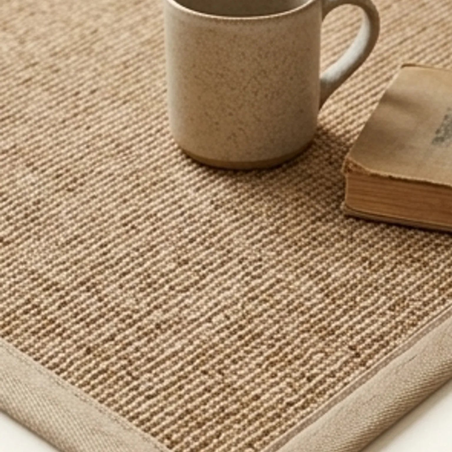 Natural Jute Rug – Handwoven | Tones, Rustic Home Decor — scale reference beside a complementary prop