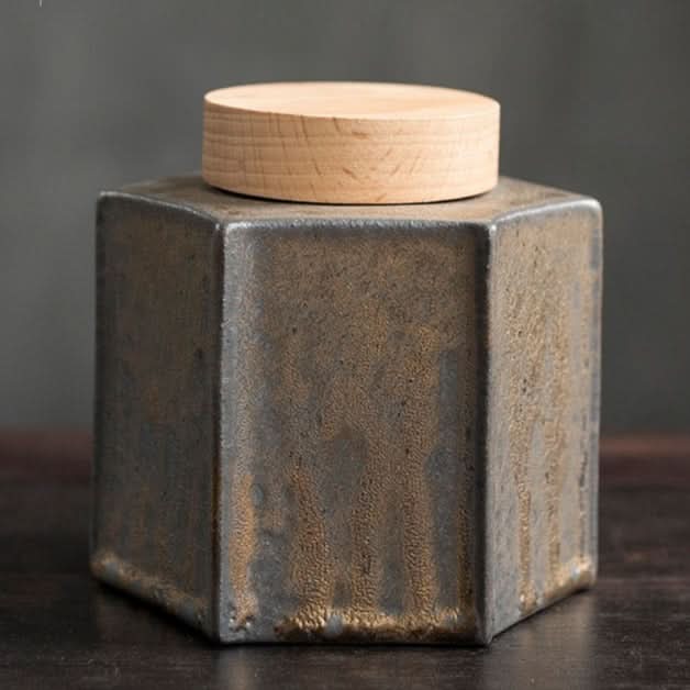 Gray ceramic tea jar with a wooden lid, home decor