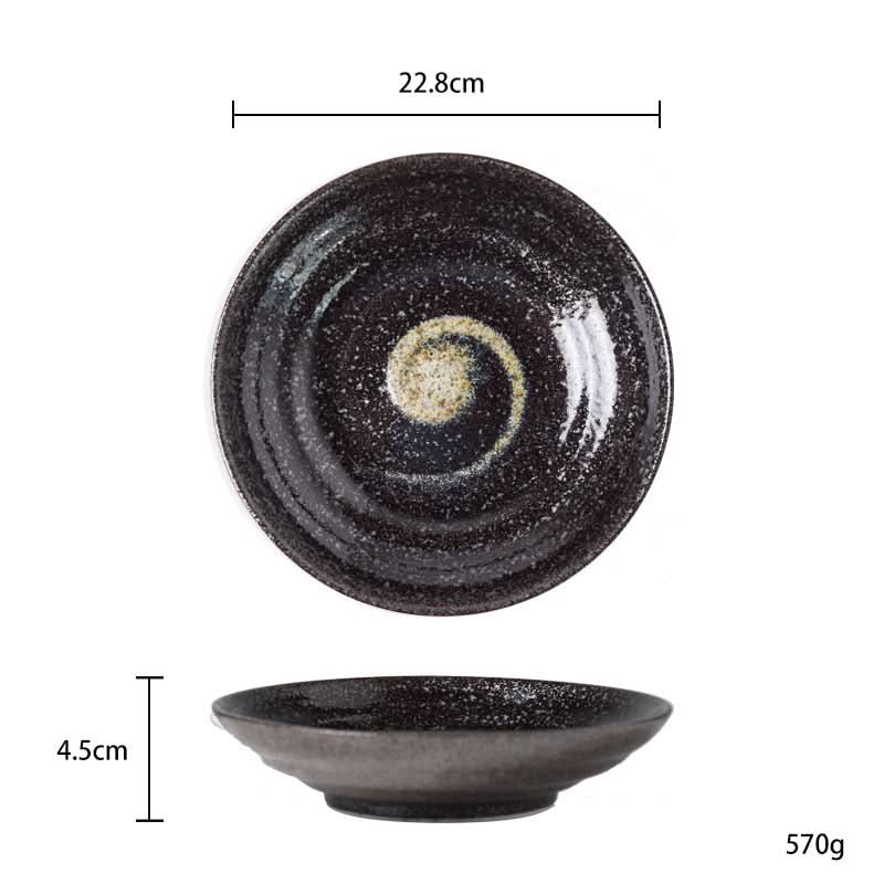 Dark Japanese Pottery Tableware 9" bowl with swirling cream & black glaze, speckled finish.