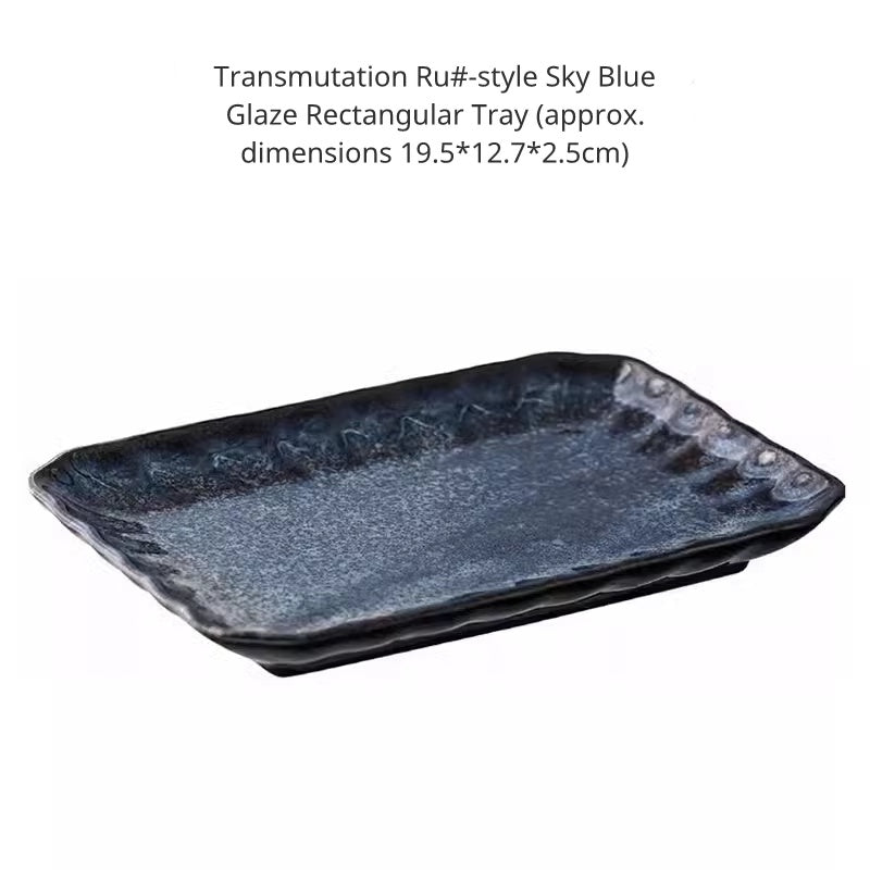Rectangular dark blue ceramic plate with uneven, rustic edges, size approx 19.5x12.7cm.
