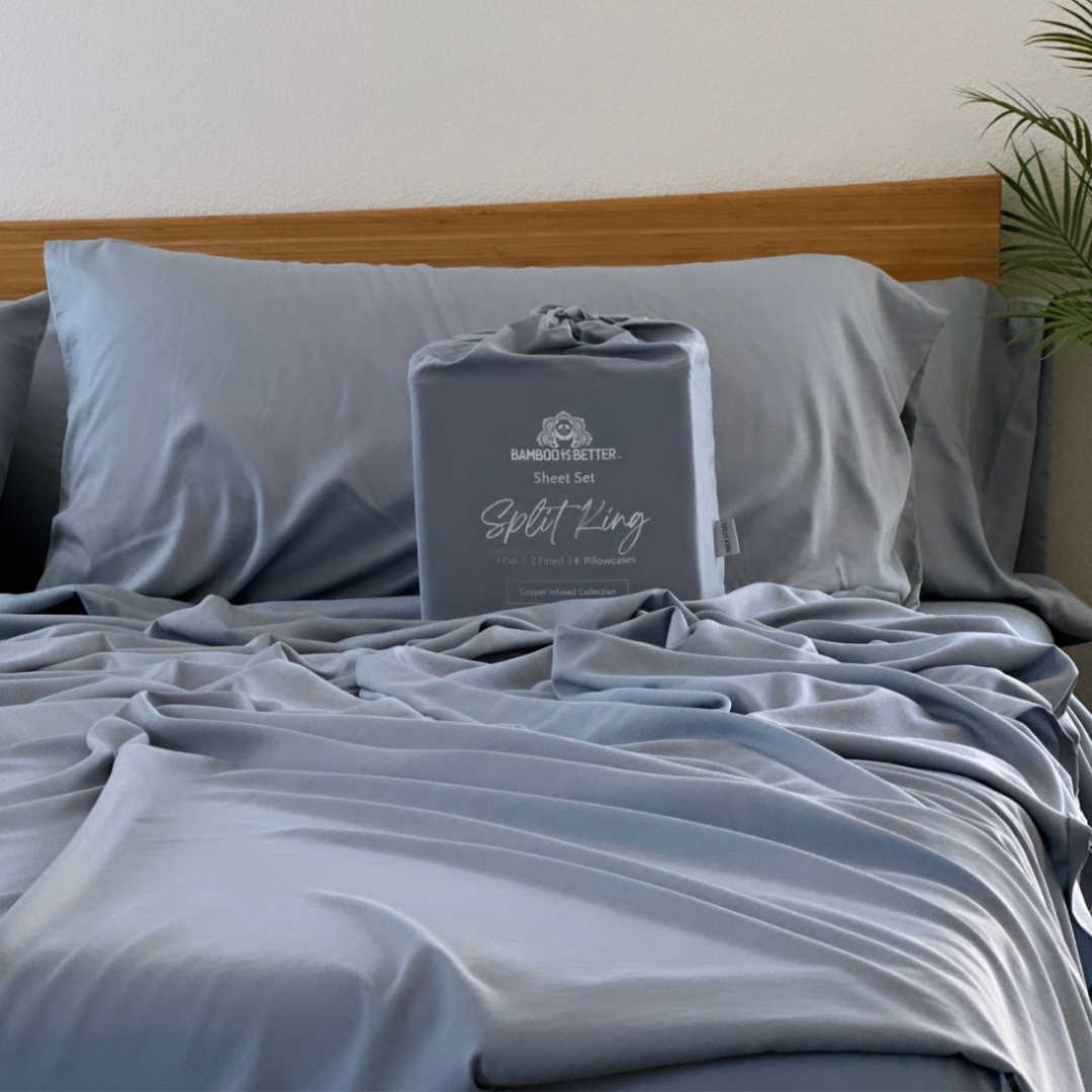 Gray Copper Infused Bamboo Pillowcase Set on a bed, featuring a folded pillowcase package.