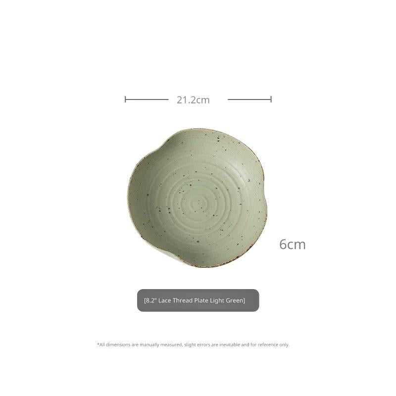 Top-down view of 8.2-inch light green speckled ceramic bowl with 21.2cm diameter and 6cm height.