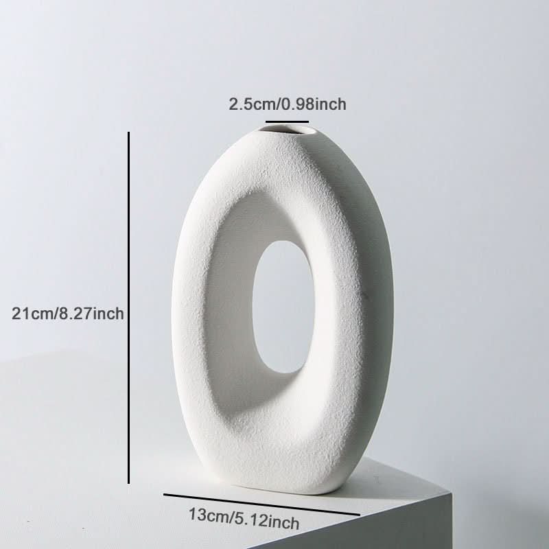 White 2x1 Nordic hollow vase for dried flowers. Minimalist textured ceramic home decor.