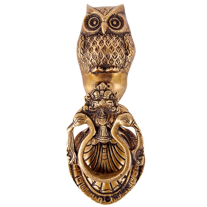 Handmade brass owl door knocker with detailed carvings and ring, perfect home decor accent.