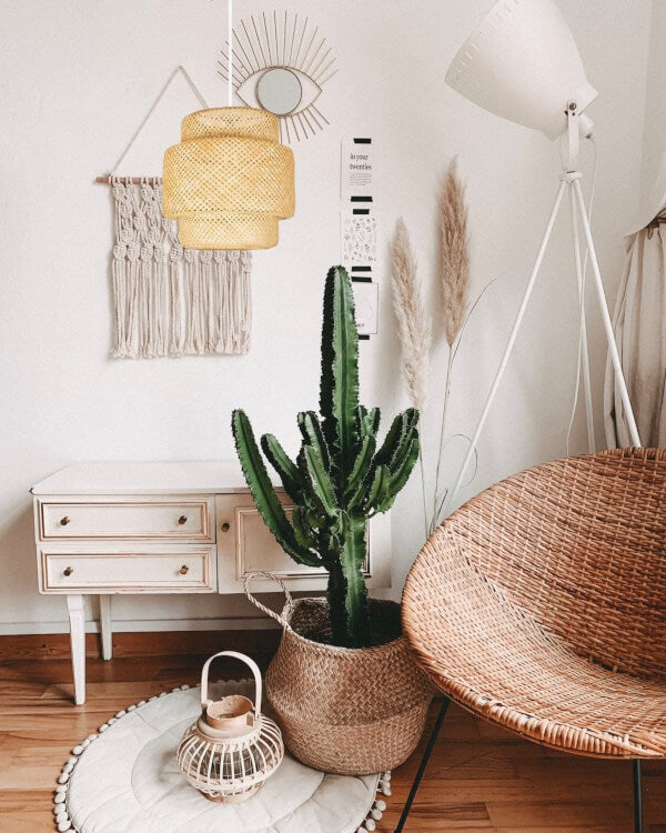 Bamboo Pendant Light, a large rattan lampshade in a boho-chic room setting.