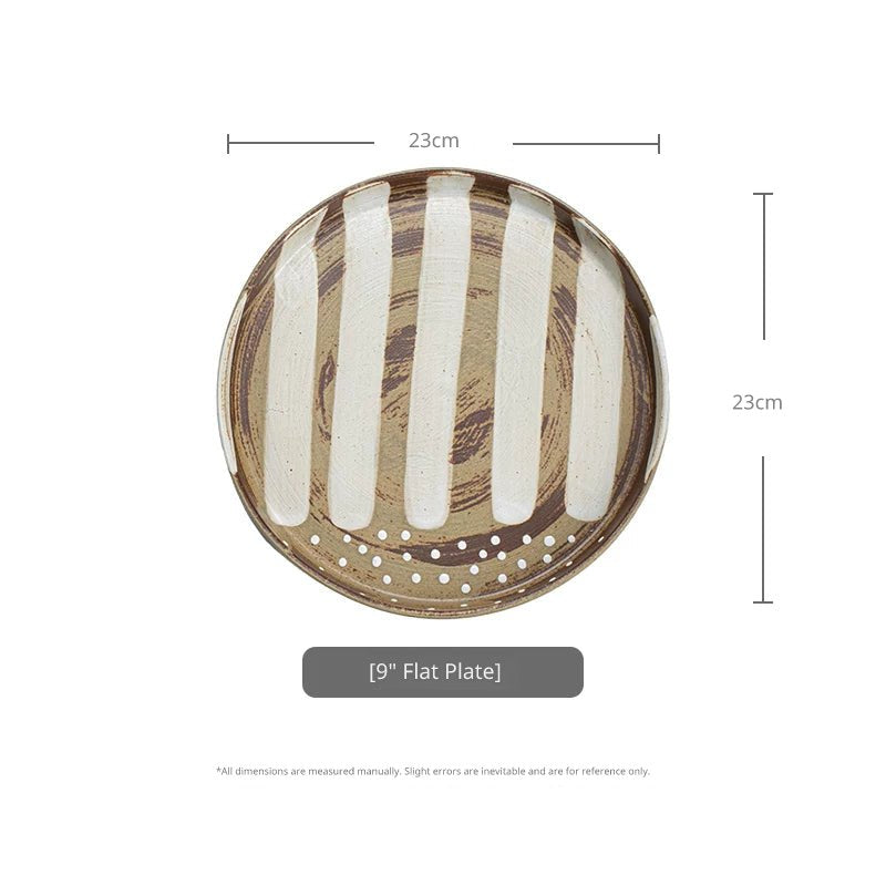 Round ceramic serving plate, 23cm, brown base with thick, vertical white stripes and polka dots.