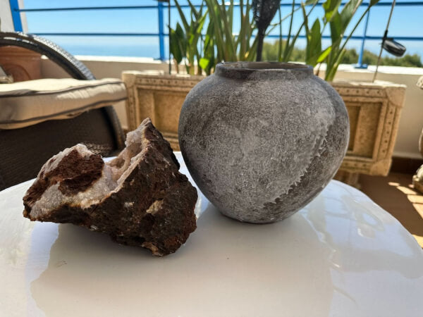 Antique Effect Ceramic Vase: Rustic stoneware pot with textured finish on white table.