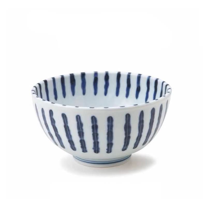 Blue and white patterned ceramic bowl, made in Japan. Home decor.