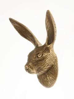 Brass hare wall hook, realistic antique gold finish, home decor accent.
