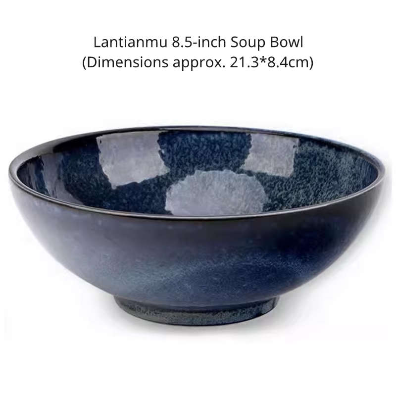 Close-up of a very large 8.5-inch soup tureen/bowl in a dark, mottled blue ceramic finish, isolated on white.