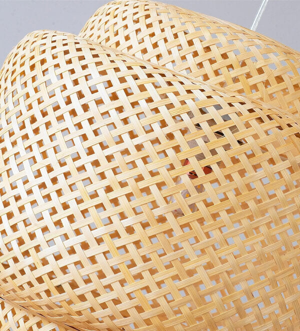 Close-up of a woven Bamboo Pendant Light with natural rattan texture, showing intricate weaving.