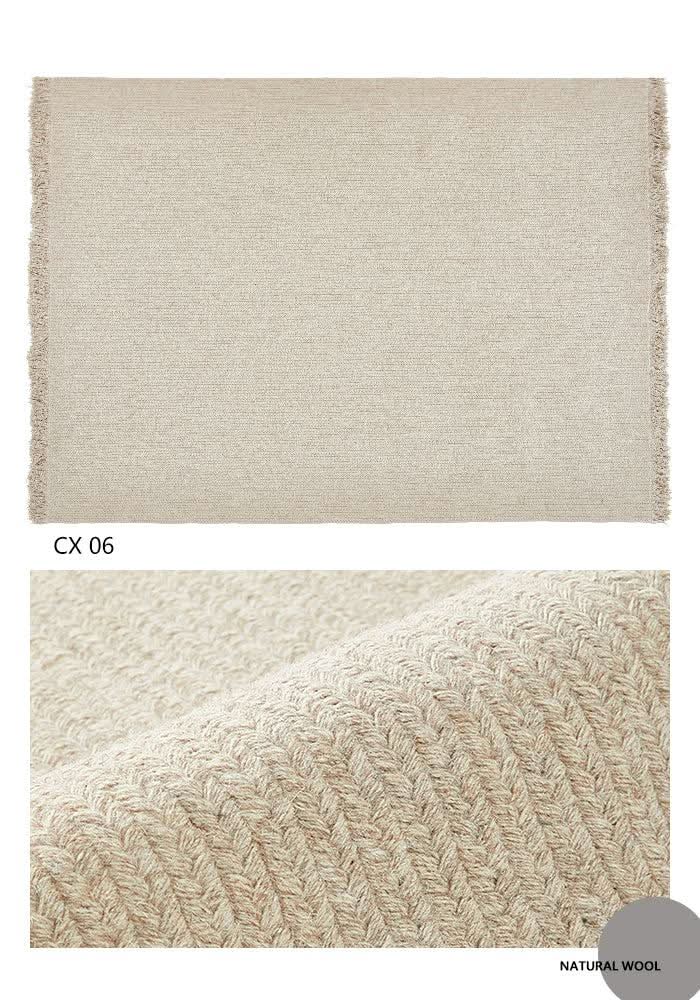 Natural wool braided rug, beige, woven texture. CX 06.