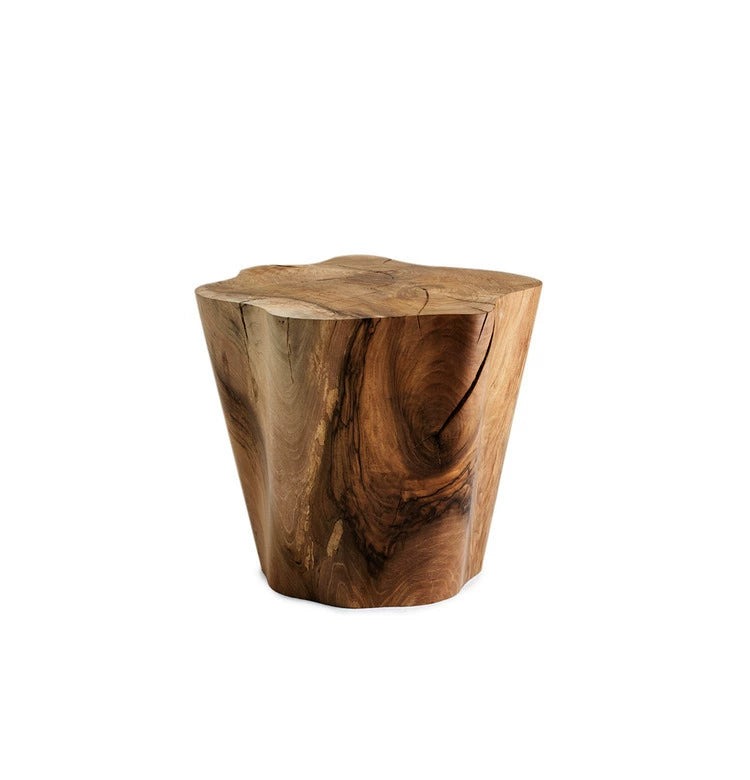 Rustic wood log side table, natural brown tones, unique wood grain and knots. Handcrafted wooden furniture.