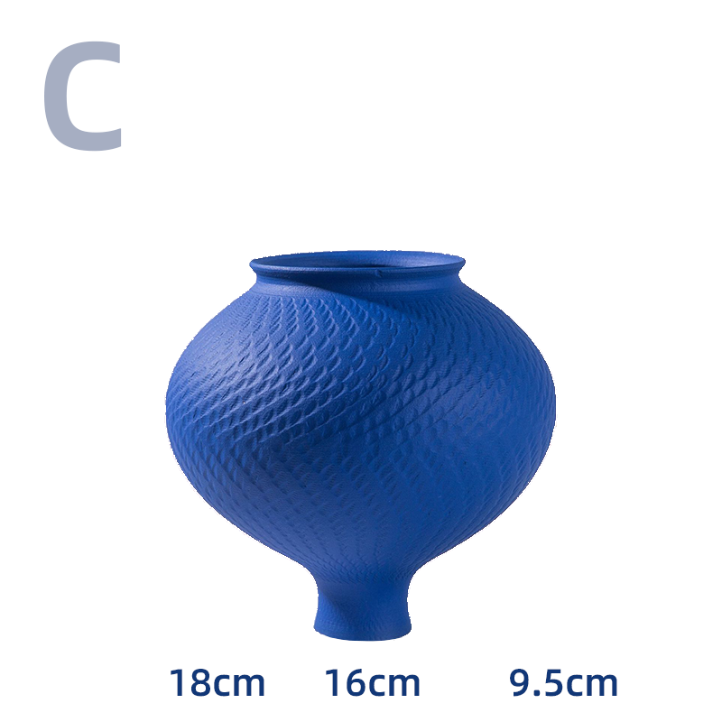 Vibrant Blue Textured Vase, matte finish, home decor accent.