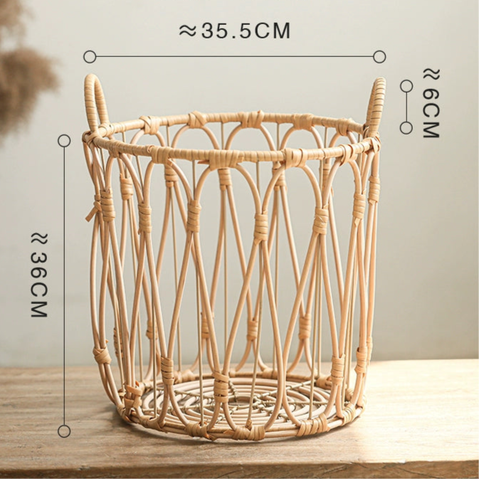 Light beige woven rattan storage basket with handles; round shape; decorative; for home organization.