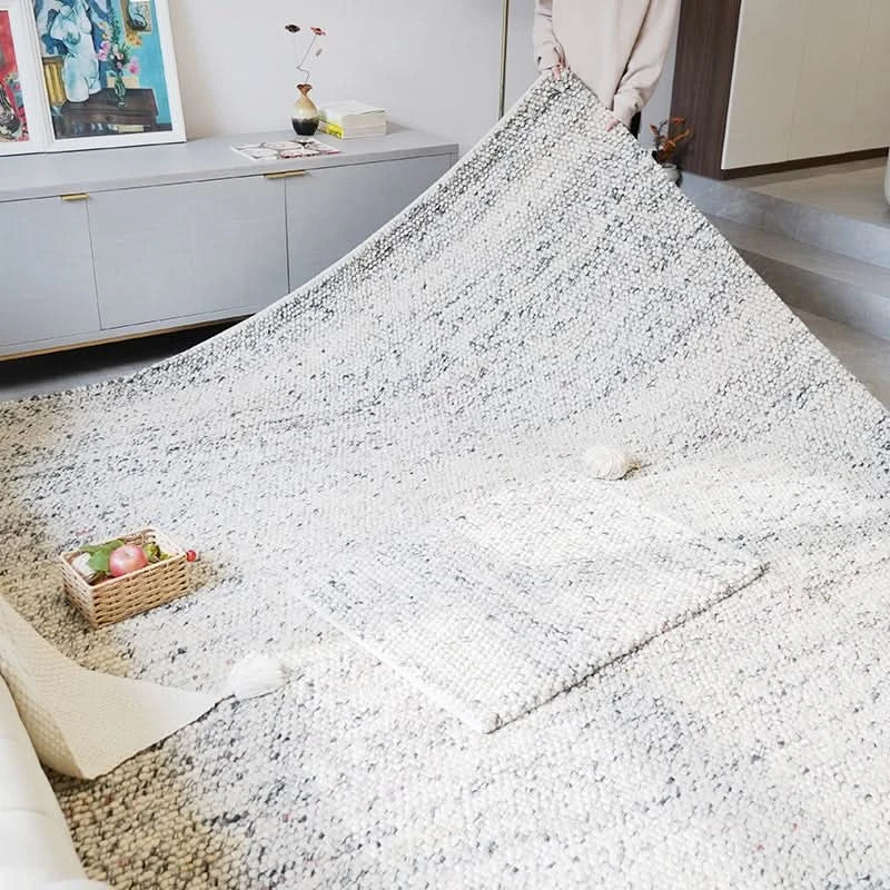 Luxurious Wool Rug in modern neutral design, a cozy addition to any living room.