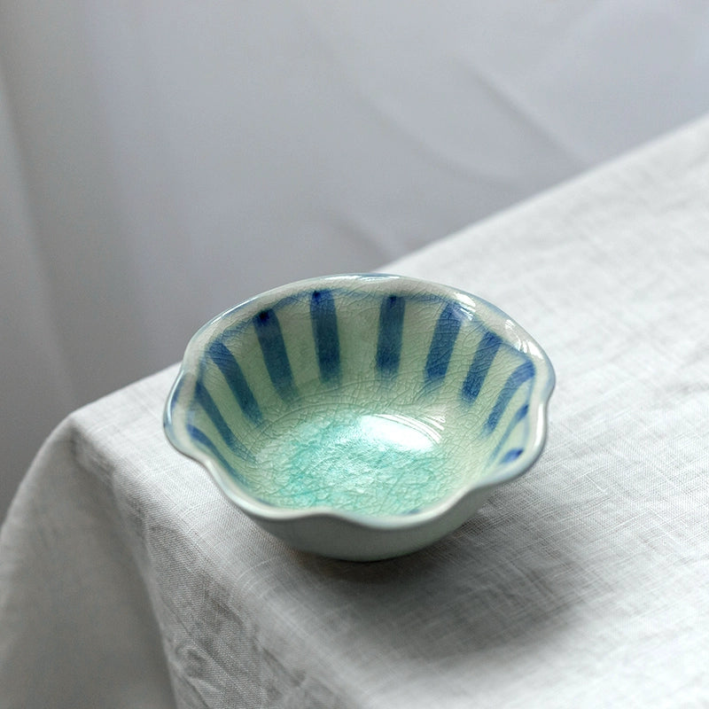 Blue and Teal Crackle Glaze Ceramic Plate Set - stylish dinnerware on white tablecloth.