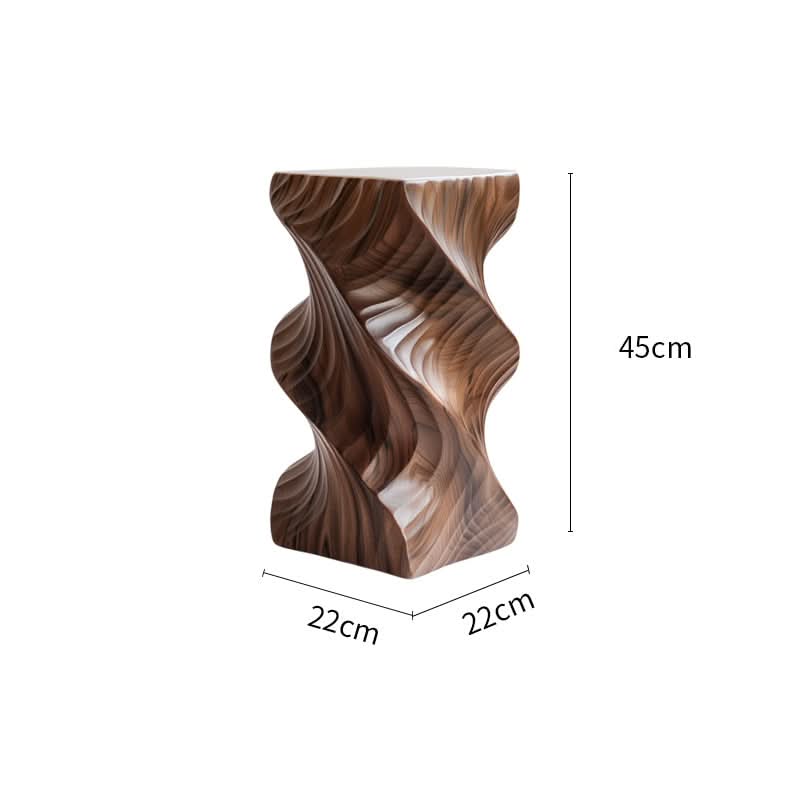 Abstract wood side table with a modern, sculptural design in rich brown tones.