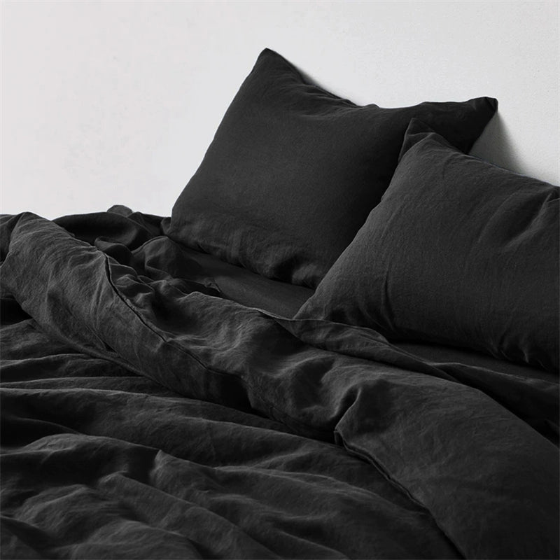 Black natural linen bedding set with soft, comfortable pillows.