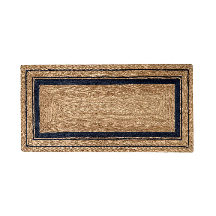 Beige jute rug with navy blue stripes.