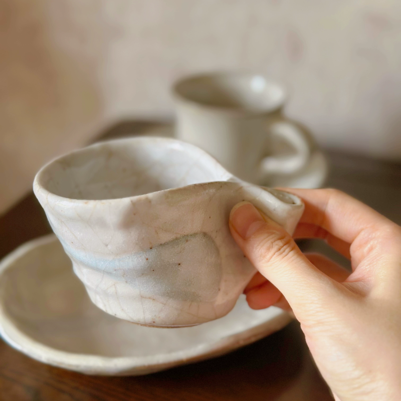 Hand-thrown Japanese vintage teacup and saucer set, cream ceramic, rustic textured finish