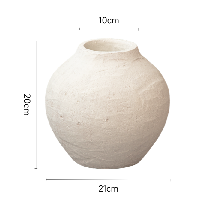 White ceramic vase, textured surface, boho style, decorative home decor.