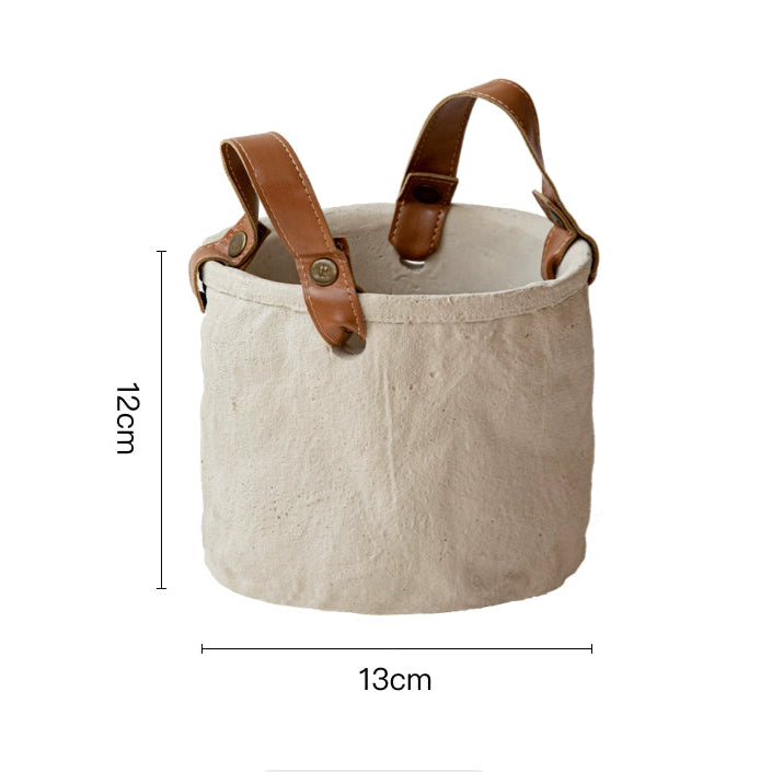 Rustic canvas plant pot with brown leather handles, part of a set of 3.