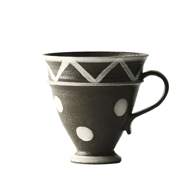 Rustic handcrafted coffee cup with white polka dots and geometric pattern. Unique home decor.