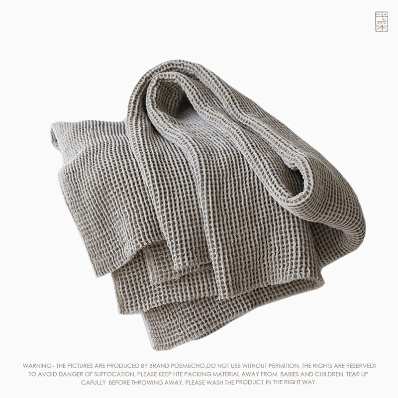 Gray Cozy Waffle Knit Linen Throw Blanket, a set of 2 beige & gray home decor essentials.