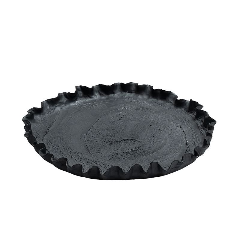 Textured black ceramic serving dish with ruffled edge. Wabi-sabi home decor.