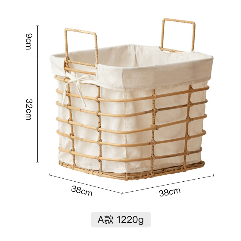 Light beige rattan laundry basket with cream linen liner; square shape with metal handles;  functional and stylish storage.
