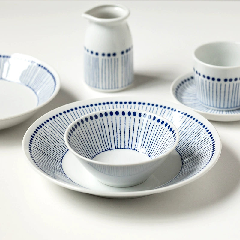 Blue & White Dotted Rim Dinnerware Set: ceramic bowls and plates with blue stripe pattern