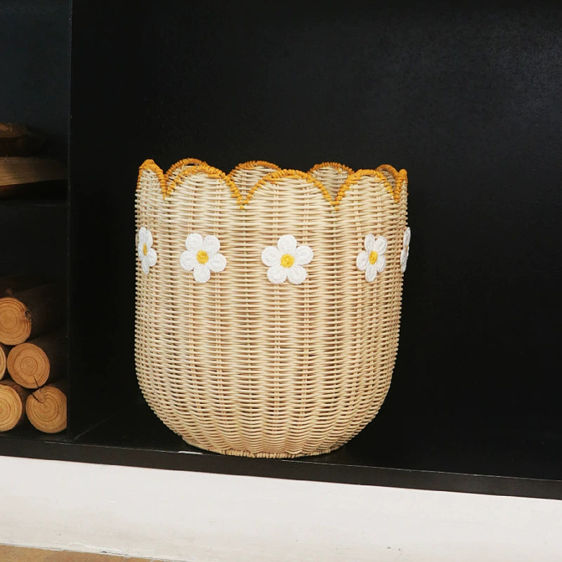 Beige woven basket with scalloped edge and white daisy embroidery.  Natural rattan.  Home decor.
