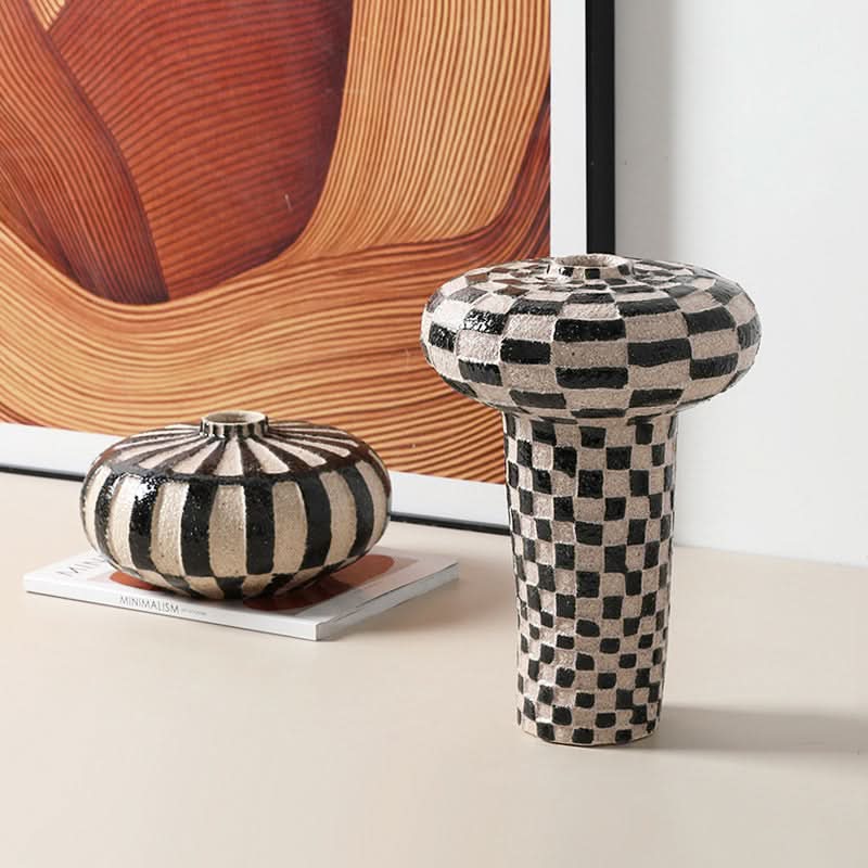 Wabi-sabi retro handpainted ceramic vases in black & white checkerboard and stripe patterns.