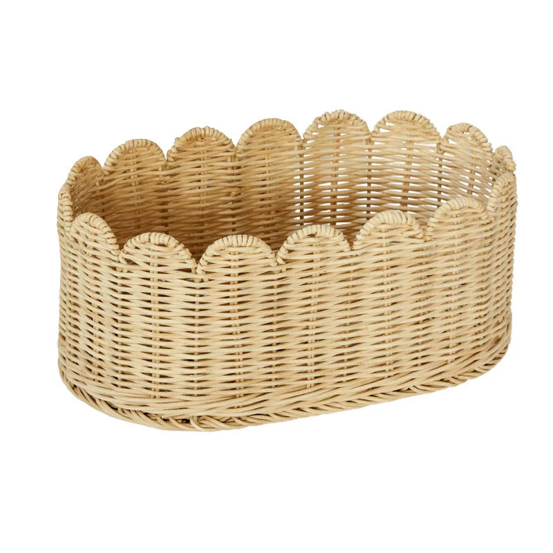 Natural rattan wicker basket with scalloped edge, home decor essential.