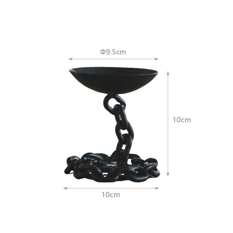 Black chain candle holder, industrial home decor accent with metal chain base.