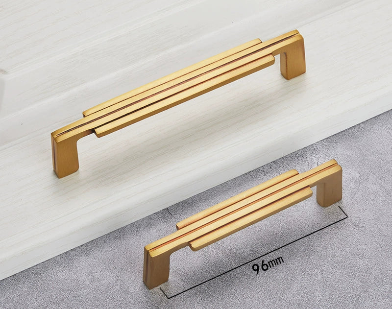 Gold colored modern minimalist single hole cabinet drawer pulls