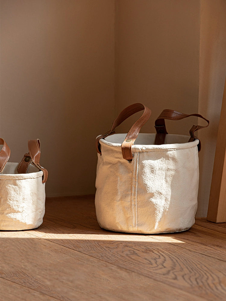Rustic canvas plant pots with leather handles, natural cream and brown, home decor.
