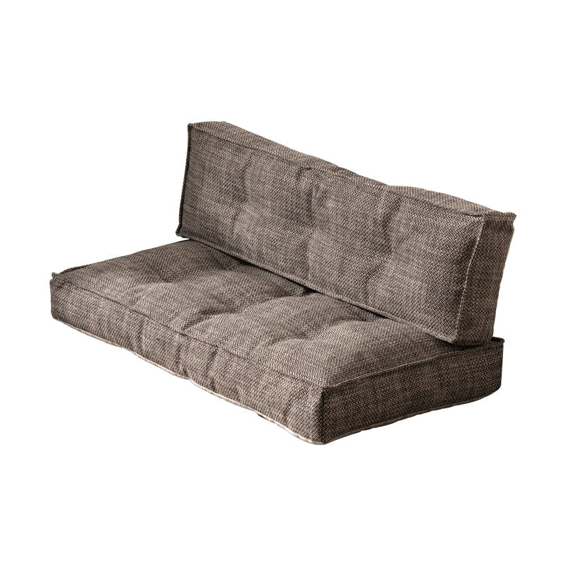Modern minimalist floor sofa in striped brown fabric, comfortable seating.