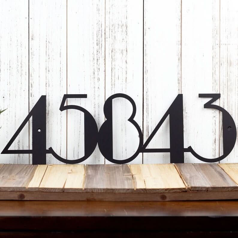 Black metal Mid Century Address Numbers 45843 mounted on rustic wood planks.