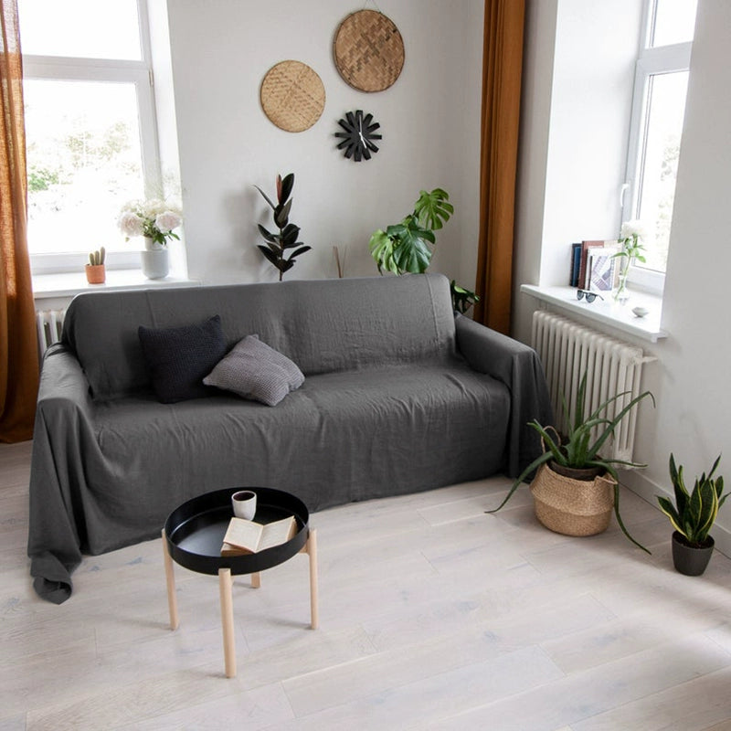 Mustard Yellow Linen Sofa Throw Blanket draped over grey couch, cozy living room decor.