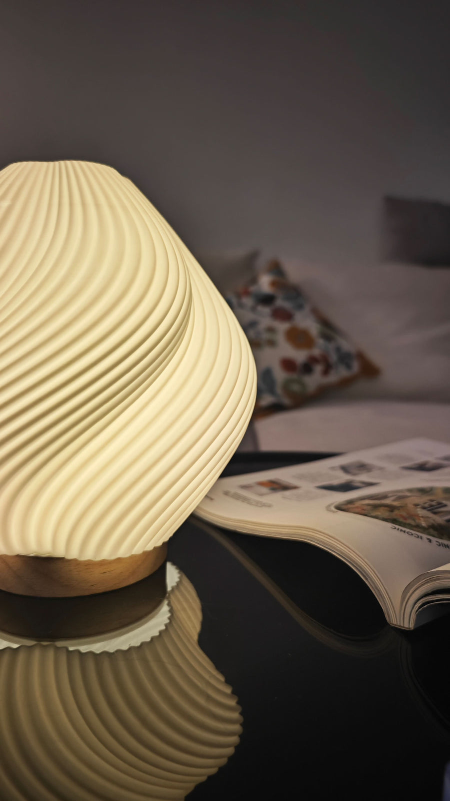 Cream 3D Printed Wave Design Creative Lamp on wood base, with book.