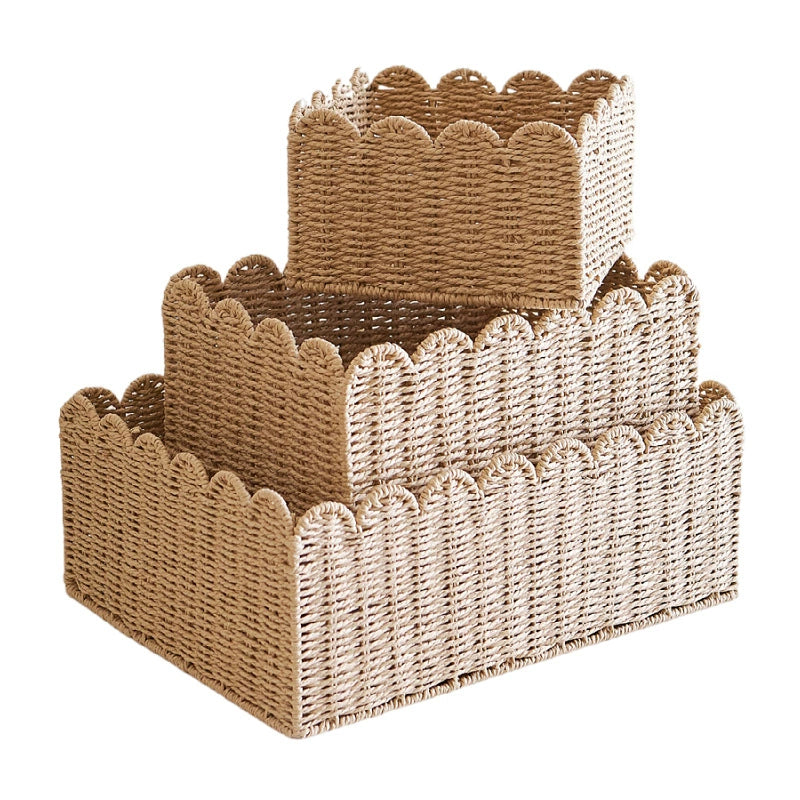 Set of 3 natural rattan storage baskets with scalloped edges.  Stacked, woven design.