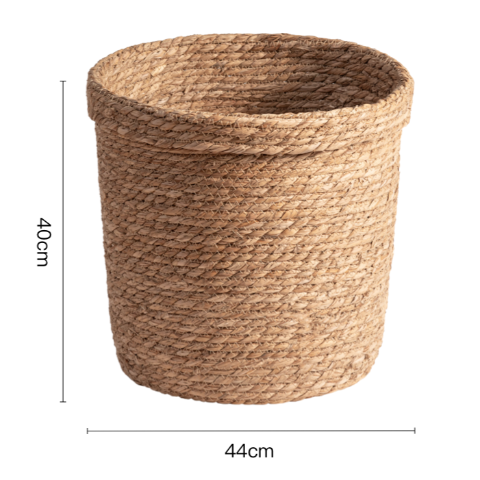 Natural rattan storage basket, round, home decor, laundry organization.