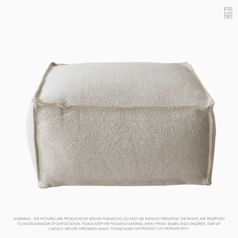 Cozy Square Knitted Pouf Ottoman in natural linen, modern boho style.