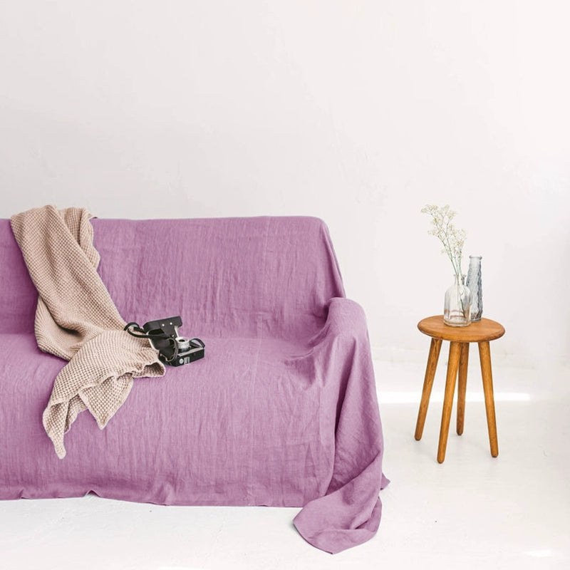 Lavender linen sofa throw blanket, beige knit blanket, camera. Cozy decor.