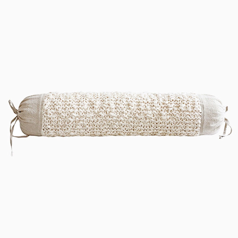 Cream knitted bolster pillow with neutral linen ends, part of the Knitted Throw Pillows Set of 4.