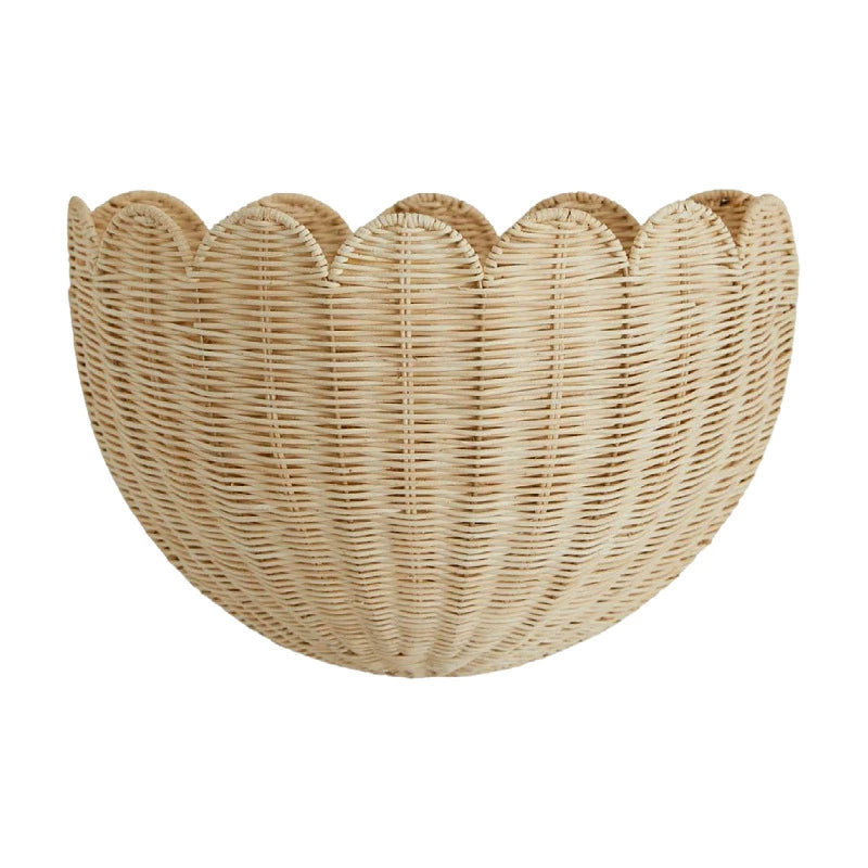 Beige scalloped wicker wall basket, decorative planter or storage.  Natural woven wicker, scalloped edge.